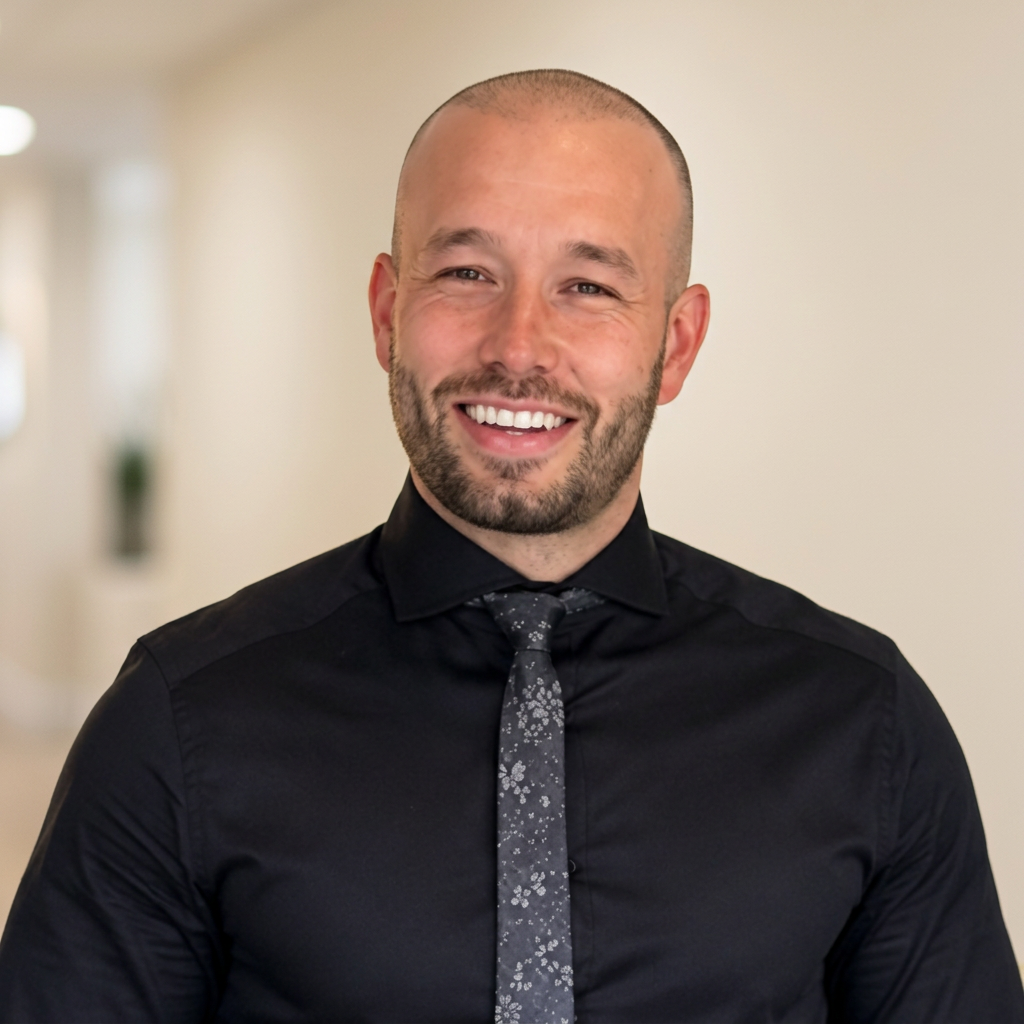 Professional headshot of Josh Cole